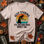 Keep Staring -- Eye Doctors Need Money Too sarcastic graphic t-shirt in Soft Pink by Snarky Sarks