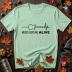 Music Keeps Me ALIVE guitar design graphic t-shirt in Mint by Snarky Sarks