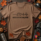 Music Keeps Me ALIVE music notes design graphic t-shirt in Sand Dune by Snarky Sarks