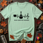 Music Makes Me Tolerable sarcastic graphic t-shirt in Mint by Snarky Sarks