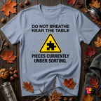 Pieces Currently Under Sorting sarcastic puzzle graphic t-shirt in Heather Prism Blue by Snarky Sarks