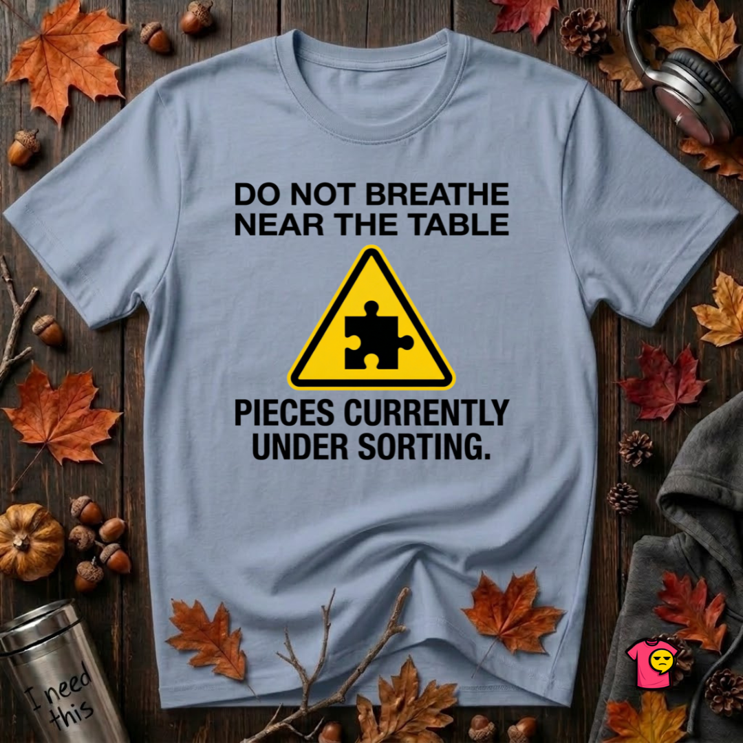 Pieces Currently Under Sorting sarcastic puzzle graphic t-shirt in Heather Prism Blue by Snarky Sarks