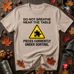 Pieces Currently Under Sorting sarcastic puzzle graphic t-shirt in Natural by Snarky Sarks