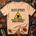 Pieces Currently Under Sorting sarcastic puzzle graphic t-shirt in Peach by Snarky Sarks