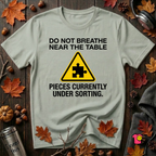 Pieces Currently Under Sorting sarcastic puzzle graphic t-shirt in Sage by Snarky Sarks