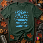 Proud Creator of Things Nobody Wanted sarcastic graphic t-shirt in Forest by Snarky Sarks