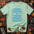 Proud Creator of Things Nobody Wanted sarcastic graphic t-shirt in Mint by Snarky Sarks