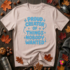 Proud Creator of Things Nobody Wanted sarcastic graphic t-shirt in Soft Pink by Snarky Sarks