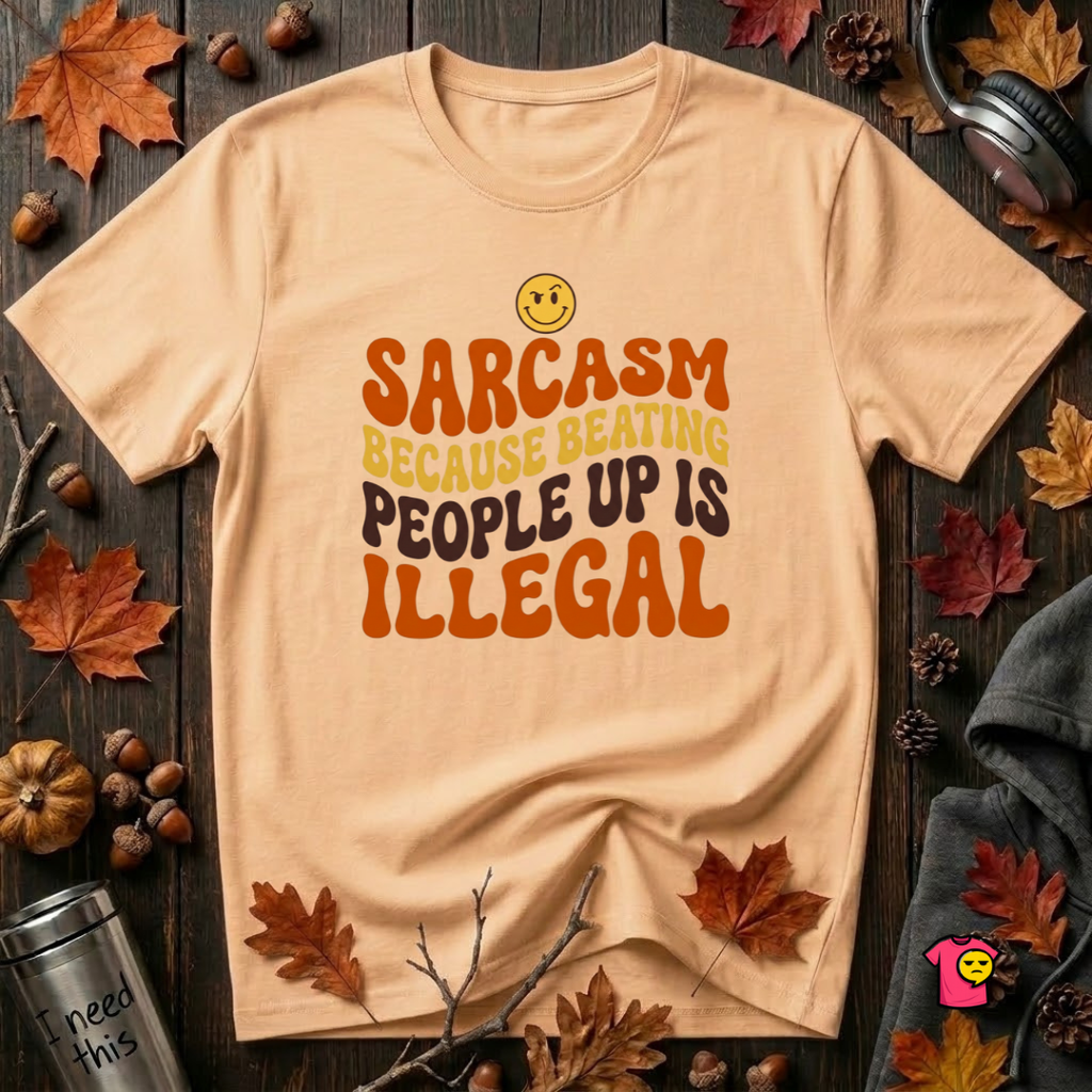 Sarcasm: Because Beating People Up Is Illegal retro smiley t-shirt in Peach by Snarky Sarks