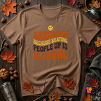Sarcasm: Because Beating People Up Is Illegal retro smiley t-shirt in Sand Dune by Snarky Sarks