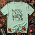 Sarcasm (Because Beating People Up Is Illegal) graphic t-shirt in Mint by Snarky Sarks