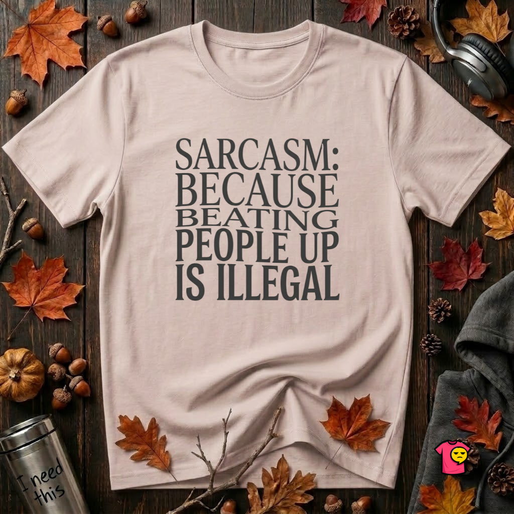 Sarcasm (Because Beating People Up Is Illegal) graphic t-shirt in Soft Pink by Snarky Sarks