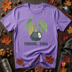 Thriving...Kinda sarcastic houseplant t-shirt in Heather Team Purple by Snarky Sarks