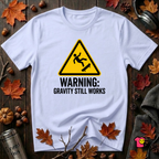 Warning Gravity Still Works sarcastic graphic t-shirt in Ash by Snarky Sarks