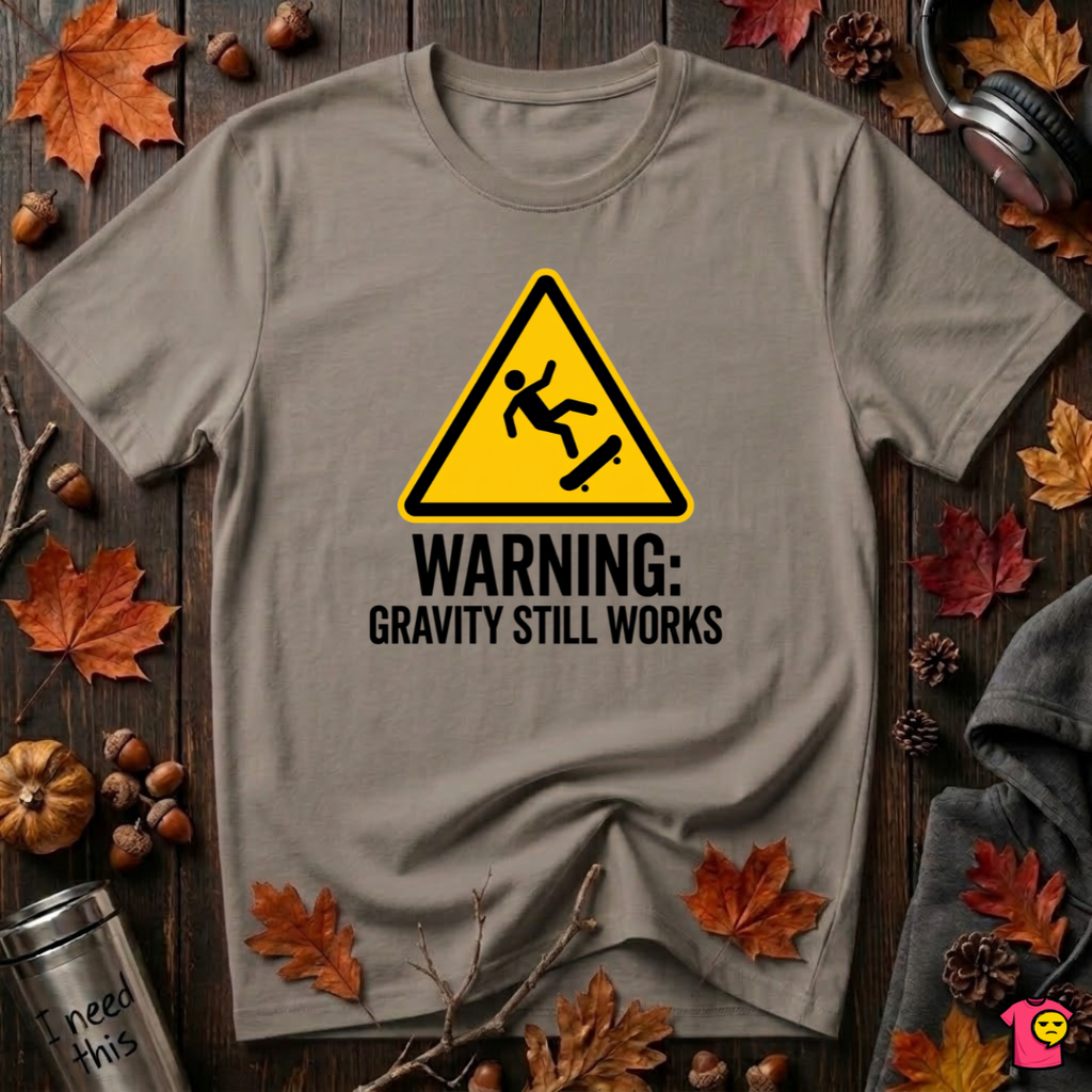 Warning Gravity Still Works sarcastic graphic t-shirt in Asphalt by Snarky Sarks