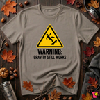 Warning Gravity Still Works sarcastic graphic t-shirt in Asphalt by Snarky Sarks