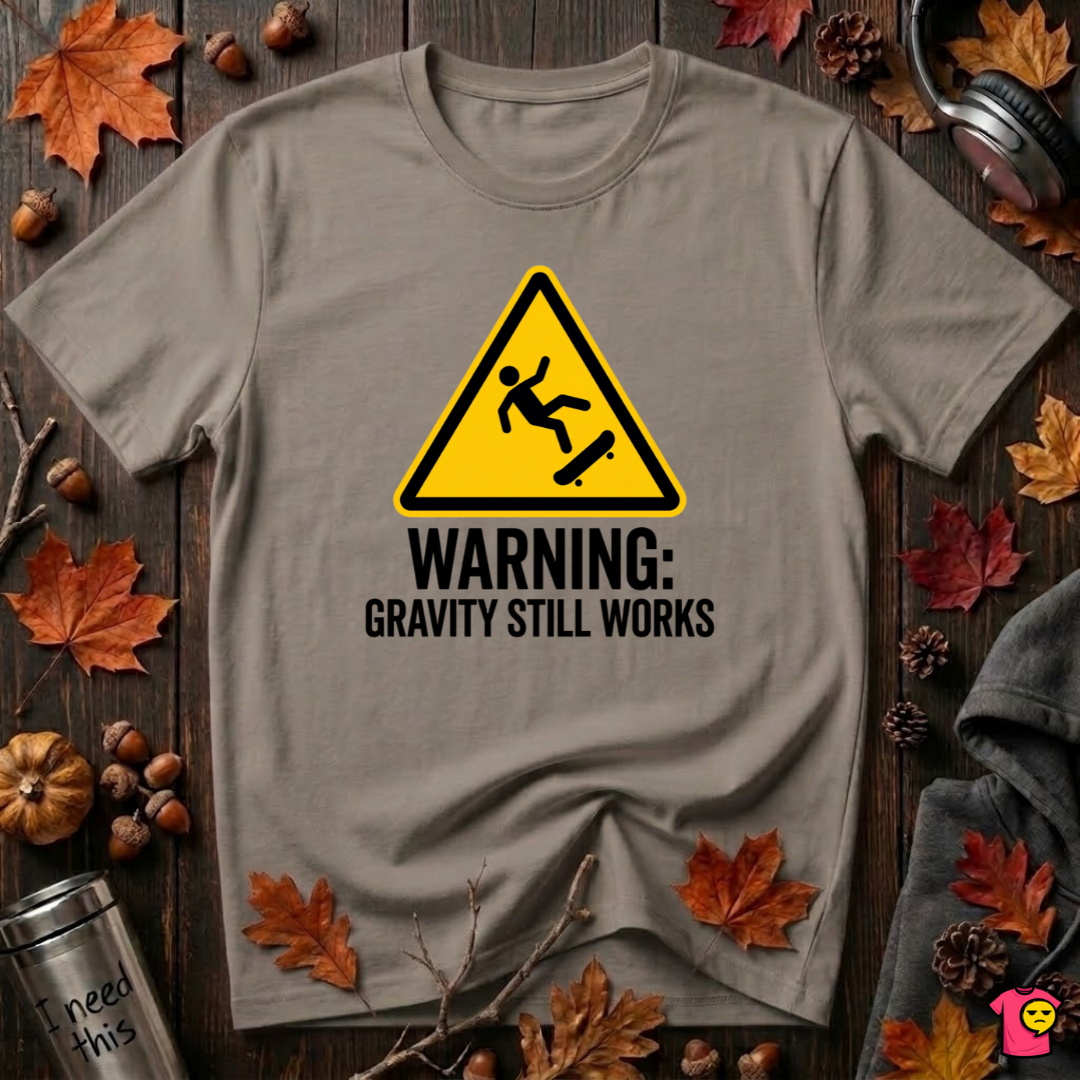 Warning Gravity Still Works sarcastic graphic t-shirt in Asphalt by Snarky Sarks