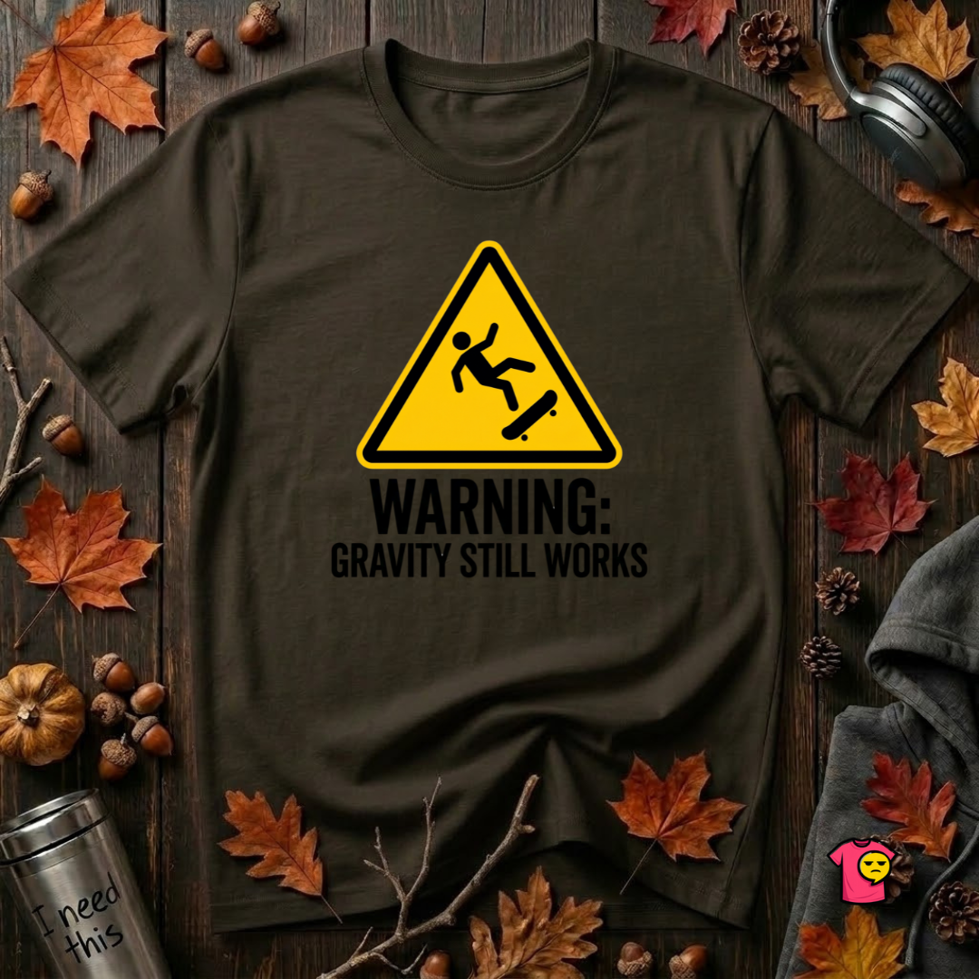 Warning Gravity Still Works sarcastic graphic t-shirt in Black by Snarky Sarks