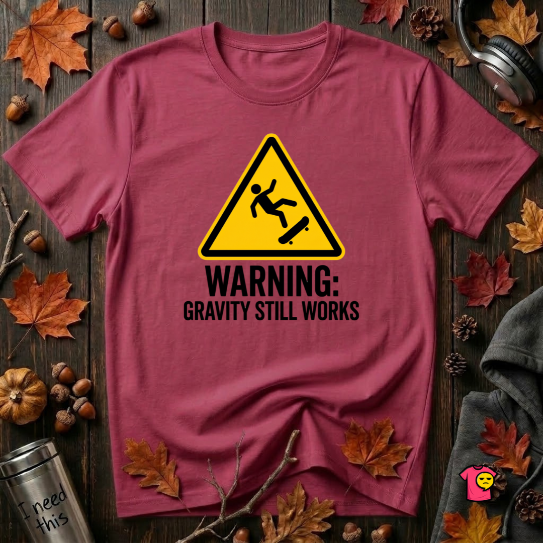 Warning Gravity Still Works sarcastic graphic t-shirt in Cardinal by Snarky Sarks