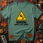Warning Gravity Still Works sarcastic graphic t-shirt in Grass Green by Snarky Sarks