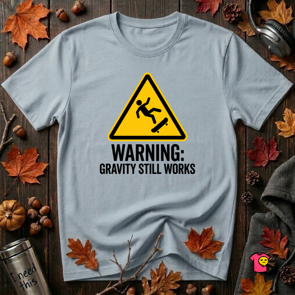 Warning Gravity Still Works sarcastic graphic t-shirt in Light Blue by Snarky Sarks