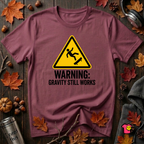 Warning Gravity Still Works sarcastic graphic t-shirt in Maroon by Snarky Sarks