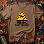 Warning Gravity Still Works sarcastic graphic t-shirt in Sand Dune by Snarky Sarks