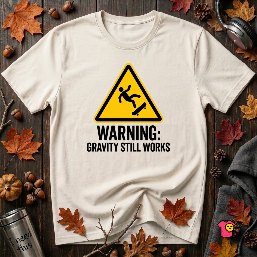 Warning Gravity Still Works sarcastic graphic t-shirt in White by Snarky Sarks